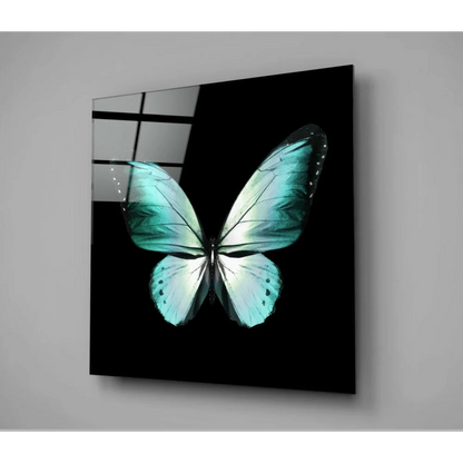Stunning teal butterfly glass wall art with turquoise wings on black acrylic