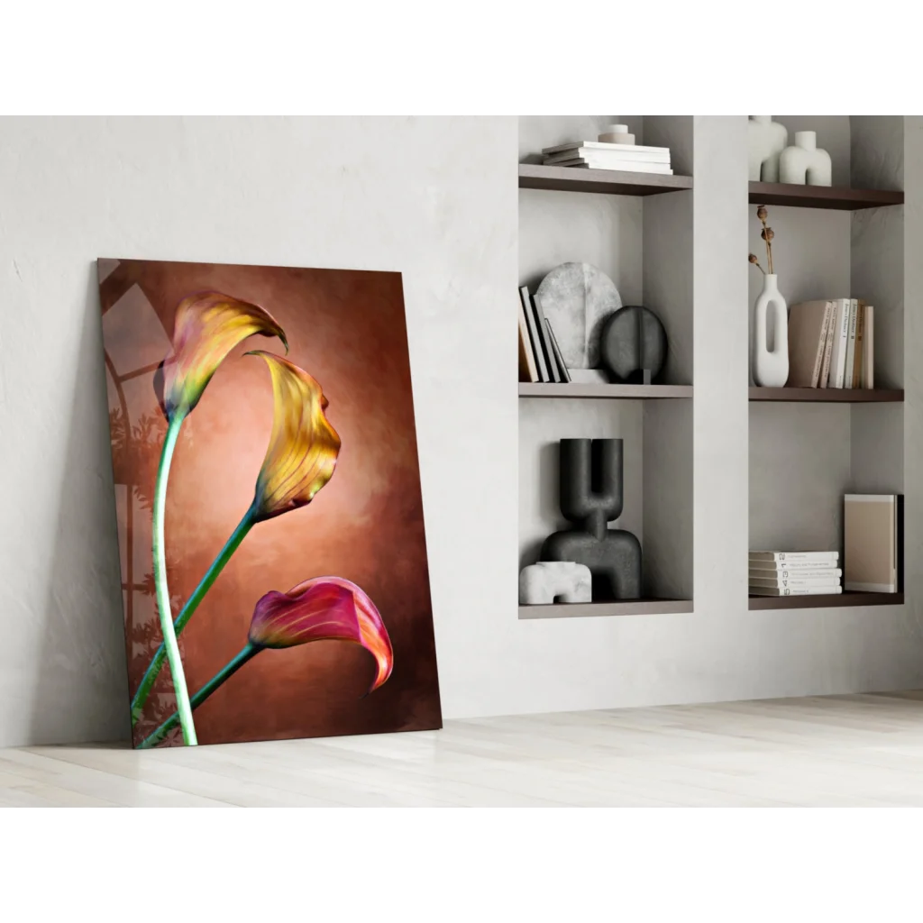 Vibrant yellow and pink calla lily wall art on white wall