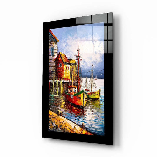 Vibrant wooden dock with boats and rustic harbor buildings in glass wall art