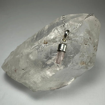 Delicate silver necklace with pinkish quartz crystal pendant