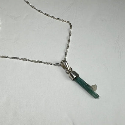 Silver twisted chain necklace with green aventurine crystal pendant