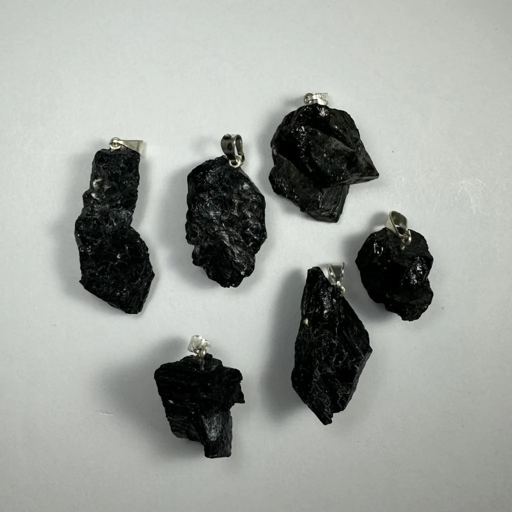 Black tumbled obsidian crystal pendants with silver clasps