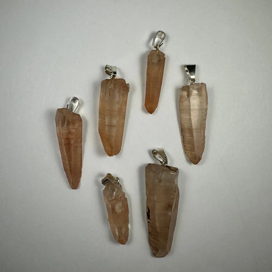 Set of six natural citrine crystal pendants with silver clasps