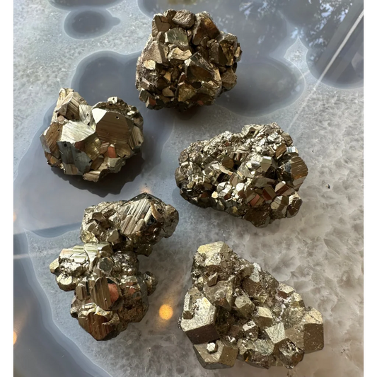 Stunning cubic pyrite cluster with golden metallic crystals