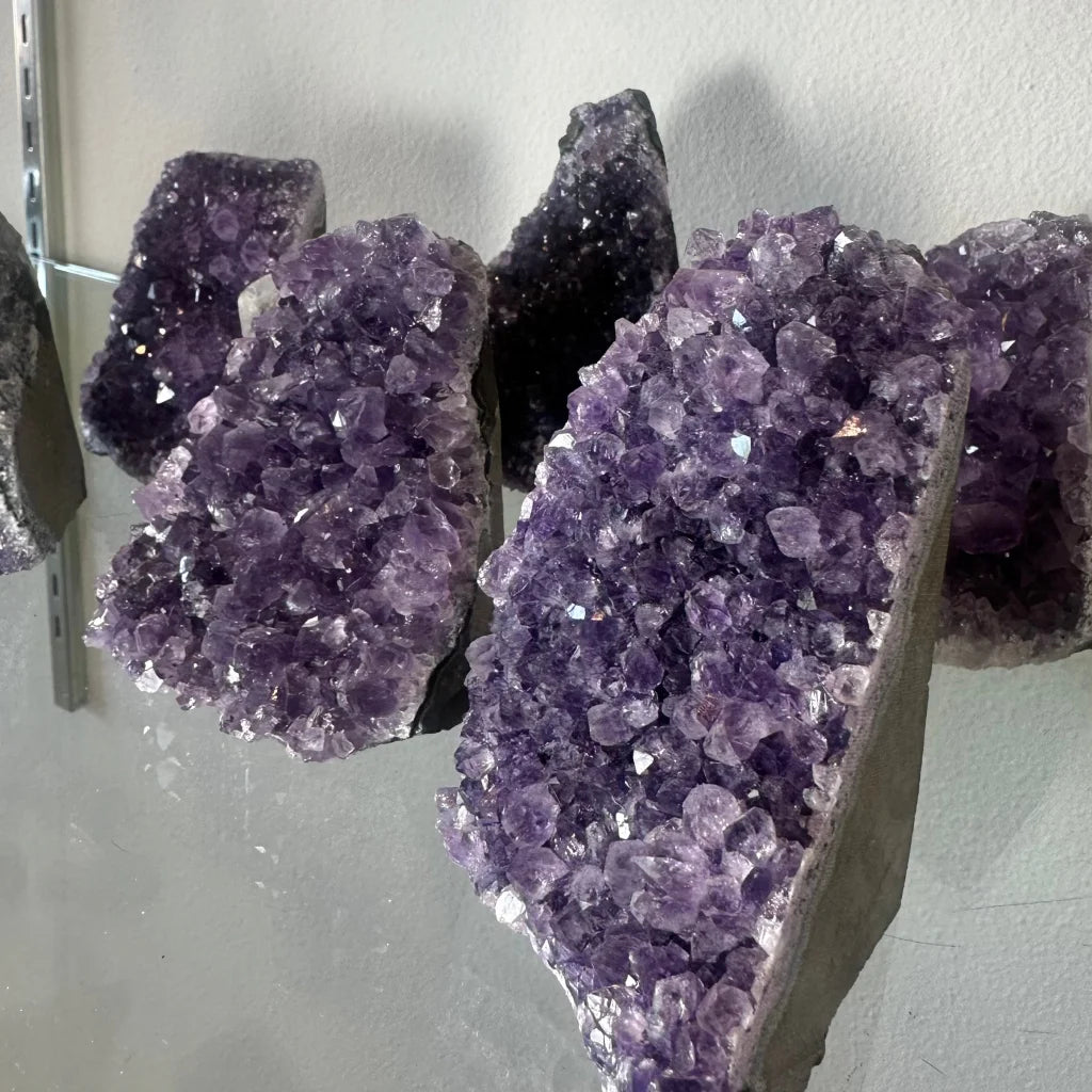Stunning cut base amethyst druze from Uruguay with purple geodes