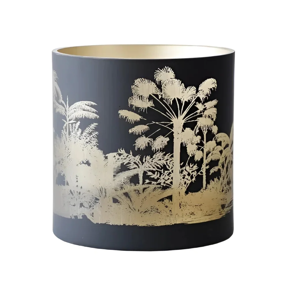 Black cylinder jungle glass candle holder with gold tropical foliage design