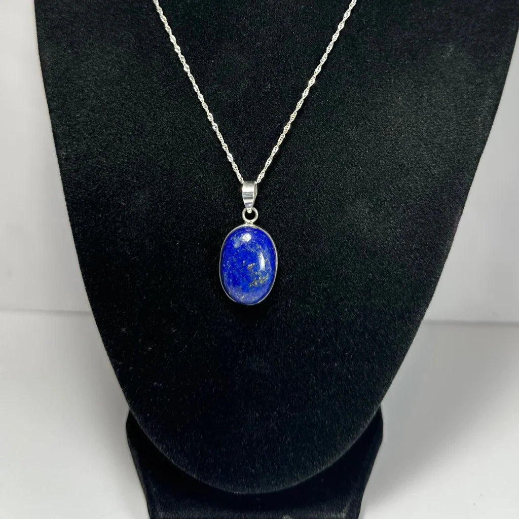 Stunning silver chain with deep blue lapis lazuli pendant and golden flecks