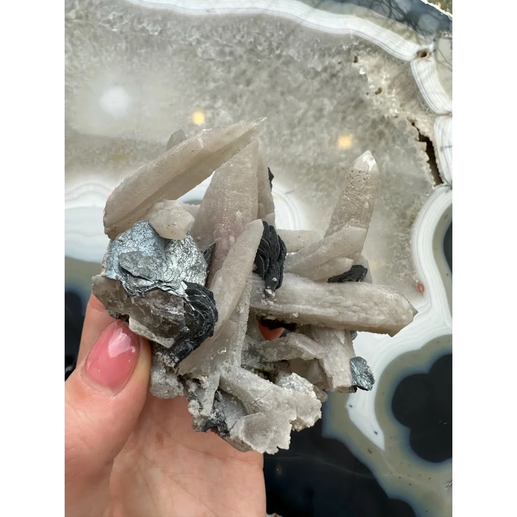 Stunning dogtooth calcite specimen with mica flakes and quartz inclusions