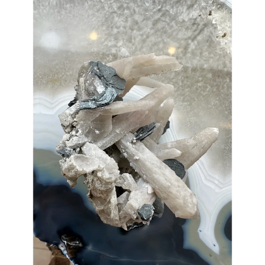 Stunning dogtooth calcite specimen with mica flakes and quartz inclusions