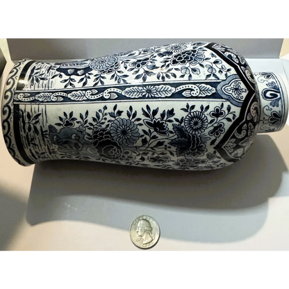 Blue and white Delft blue vase with floral patterns from early 1900s Delftware
