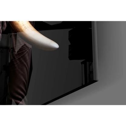 Polished ivory tusk glass wall art with textured elephant detail