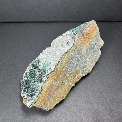 Rugged epidote crystal clusters on natural matrix with green-blue hues