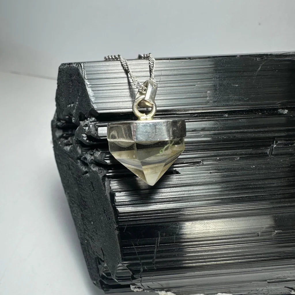 Stunning faceted quartz pendant in sterling silver with citrine crystal