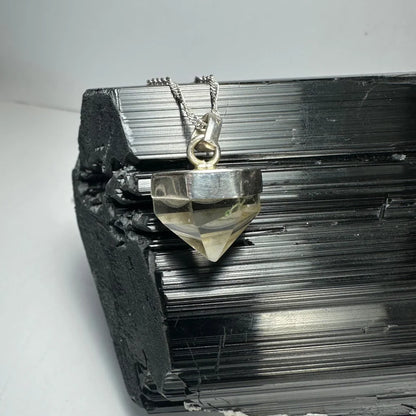 Stunning faceted quartz pendant in sterling silver with citrine crystal