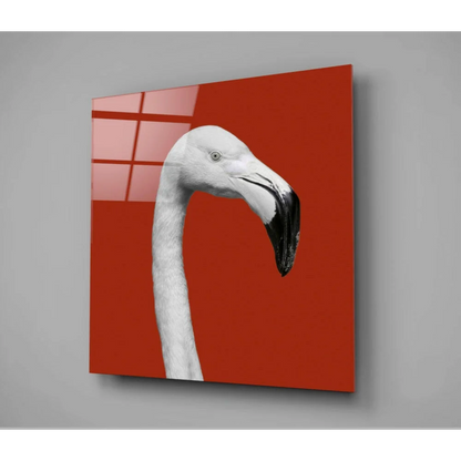 Sleek monochrome flamingo glass wall art on bold red backdrop