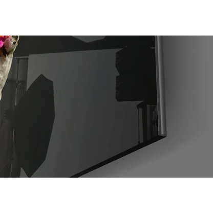 Vibrant floral glass wall art with black glossy TV frame