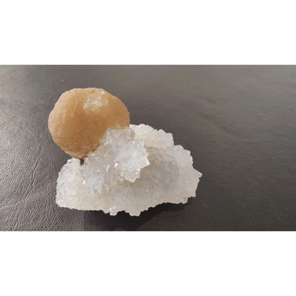 Stunning translucent amber fluorite ball on quartz matrix from India