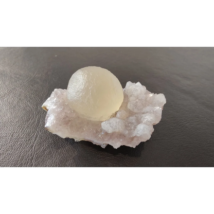 Stunning translucent pale yellow fluorite ball on quartz matrix from India