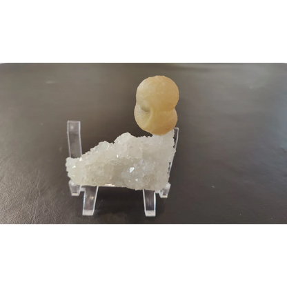 Pale yellow fluorite ball on quartz matrix from India