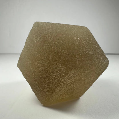 Stunning translucent amber fluorite dodecahedron crystal from China