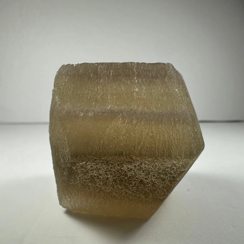 Stunning amber fluorite dodecahedron crystal from China