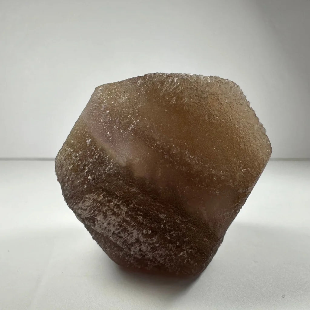 Stunning translucent brown fluorite dodecahedron crystal from China