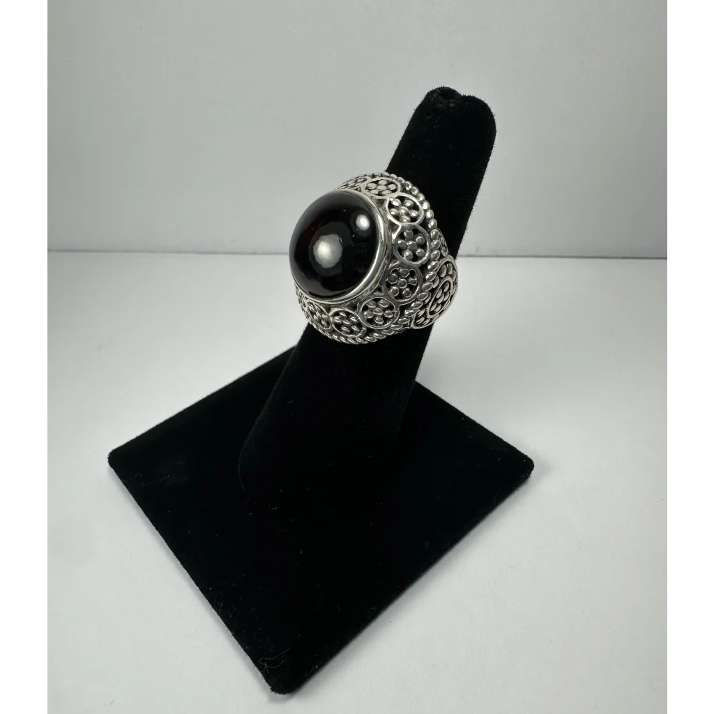 Stunning garnet ring in ornate silver filigree with black onyx stone