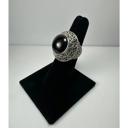 Stunning garnet ring in ornate silver filigree with black onyx stone