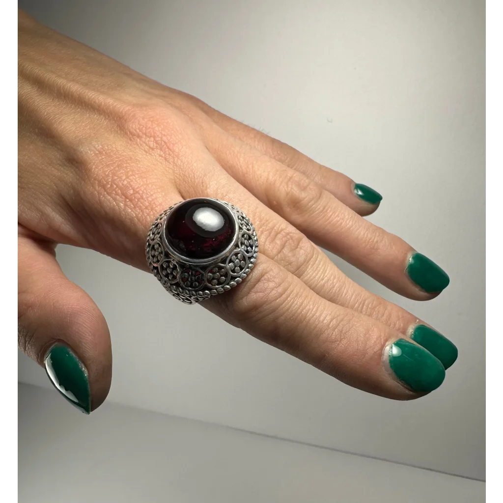 Stunning garnet ring in ornate silver filigree with bold red stone