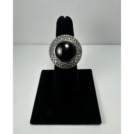 Stunning garnet ring with ornate silver filigree and black onyx stone