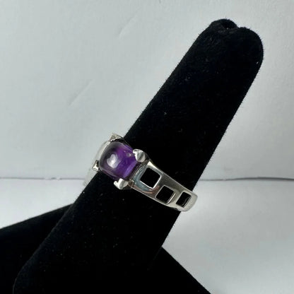 Stunning geometric amethyst ring in sterling silver with faceted purple stone