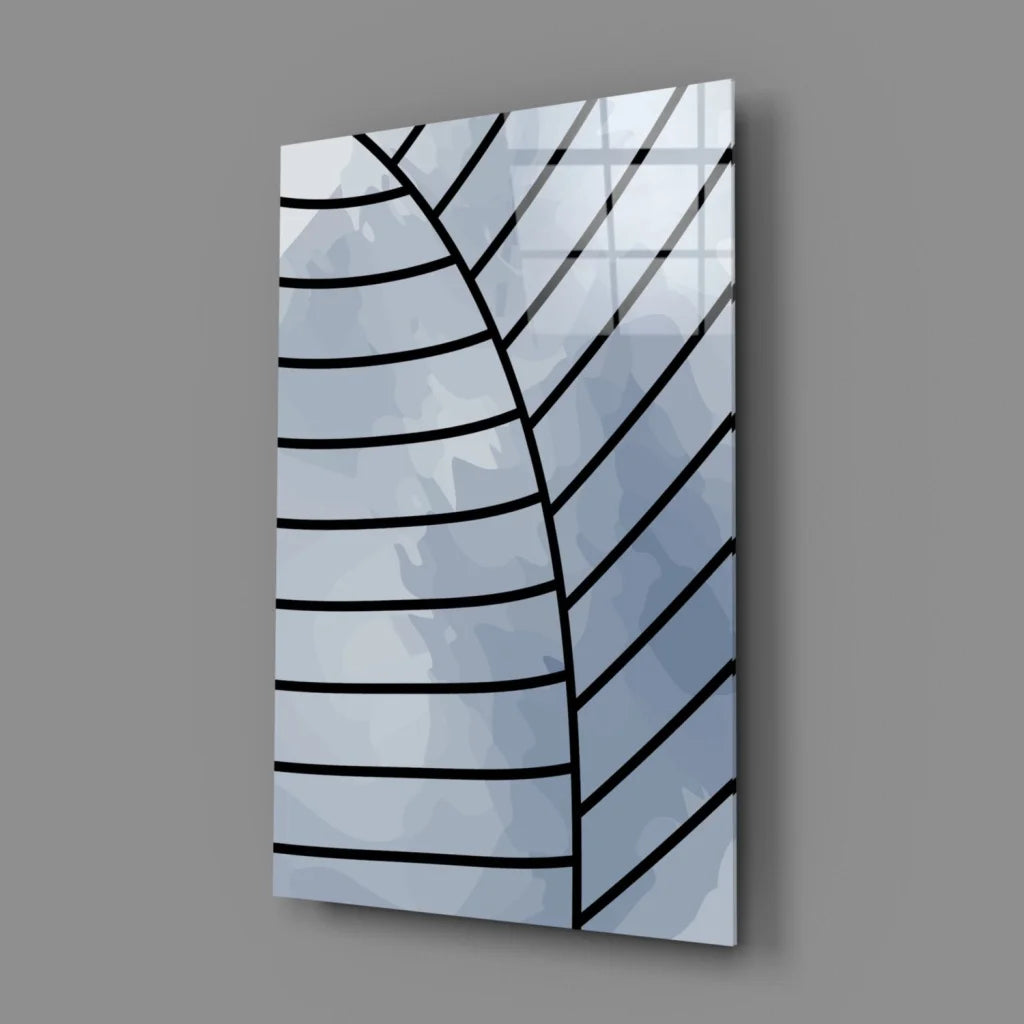 Stunning bold blue geometric lines on glossy black and white glass wall art