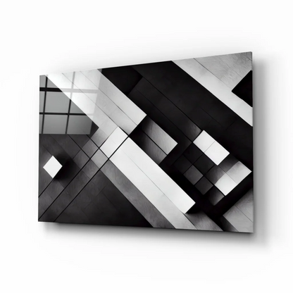 Black and white geometric glass wall art with metallic shine