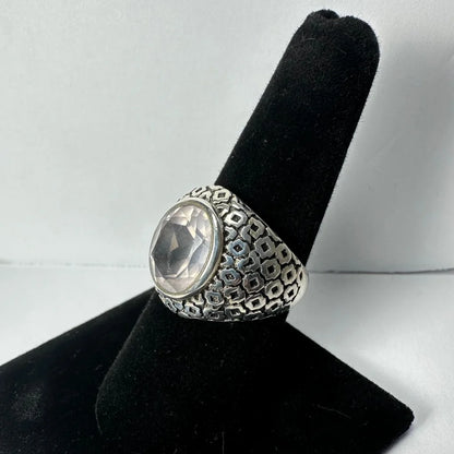 Stunning silver quartz ring with faceted clear stone and geometric band