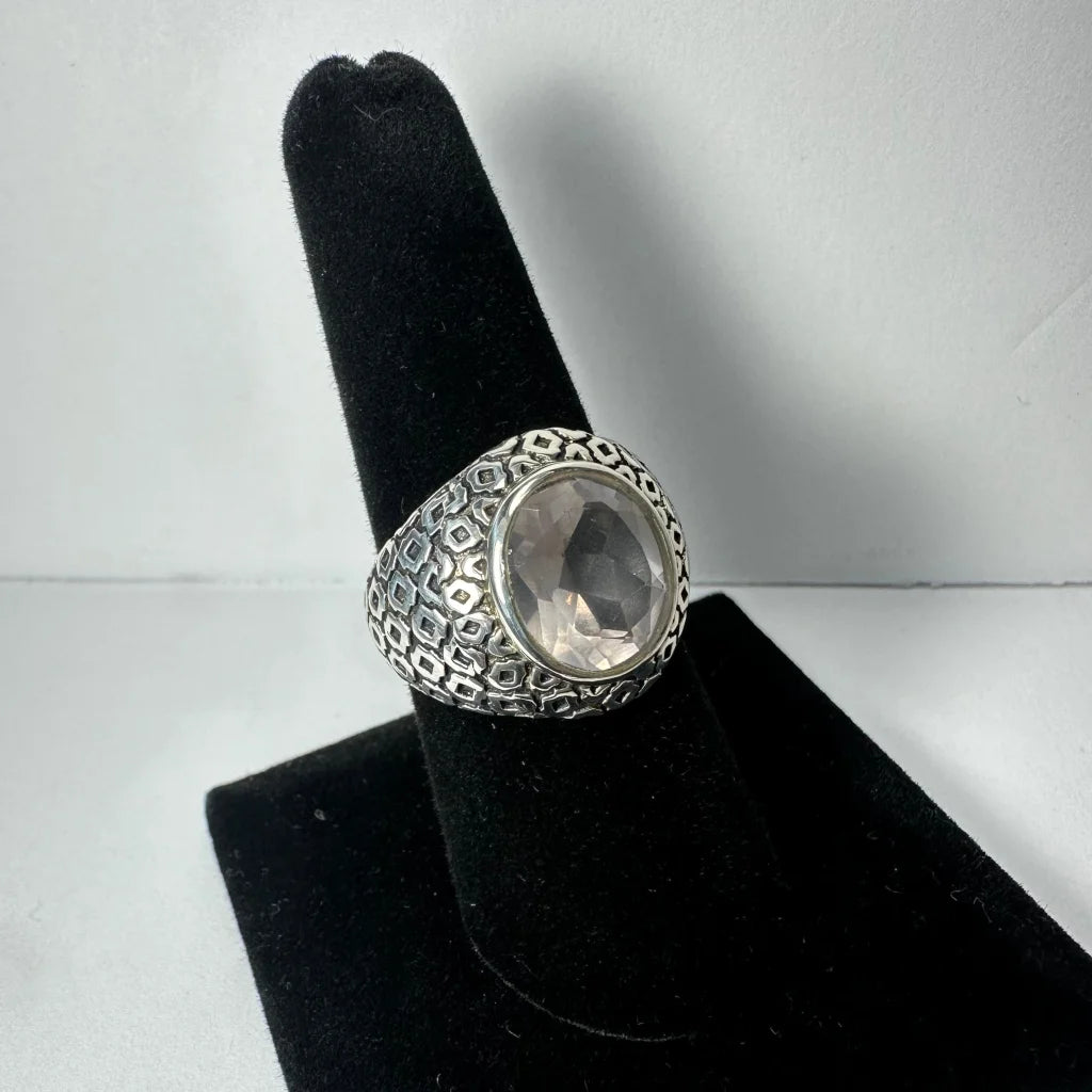 Stunning geometric silver rose quartz ring with faceted oval stone
