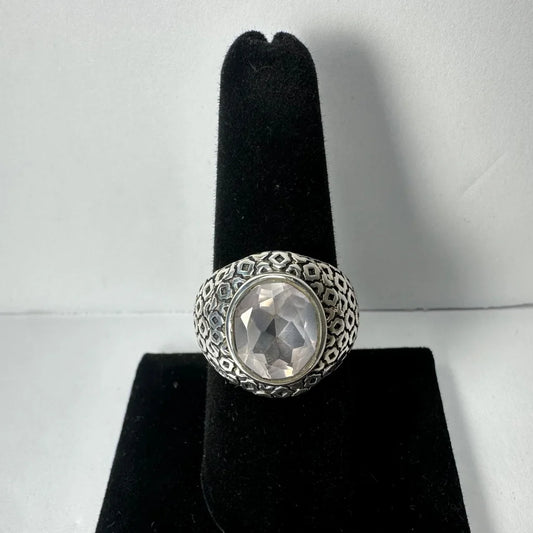 Stunning silver quartz ring with geometric band and faceted clear stone