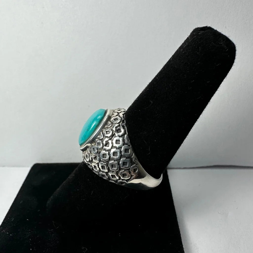 Stunning geometric turquoise ring in textured silver band