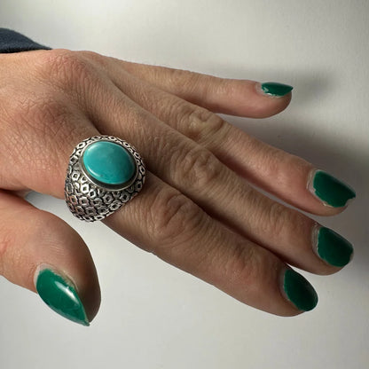 Stunning geometric turquoise ring in textured silver with oval stone