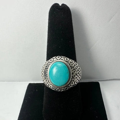 Stunning geometric turquoise ring in textured silver with oval stone
