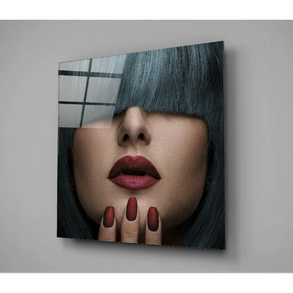Stunning glass wall art of blue hair clip with red lipstick and brown nail polish