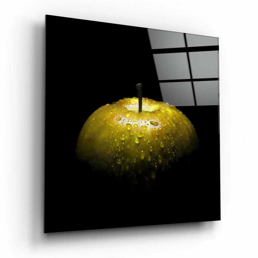 Glossy gold apple with water droplets in stunning glass wall art