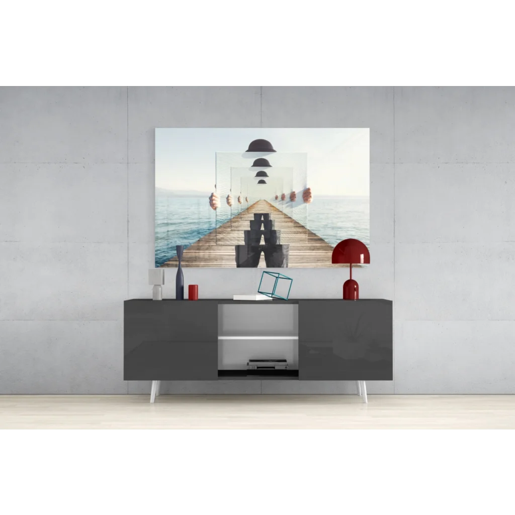 Modern gray sideboard with sleek white legs and red accents in glass wall art