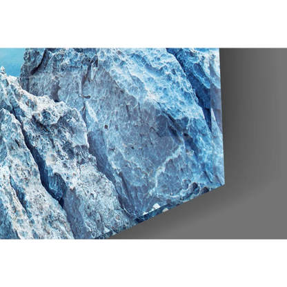 Rugged icy mountain glass wall art in blue and white canvas print