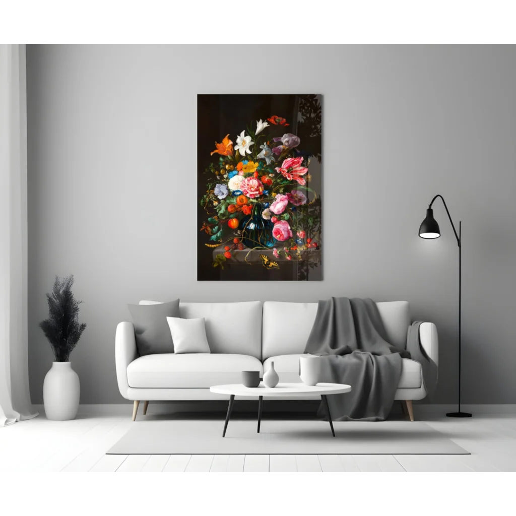 Vibrant floral glass wall art in blue vase over modern white sofa