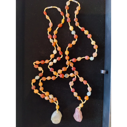 Stunning Gobi Desert agate bead necklace in warm orange, red, pink tones with teardrop charms