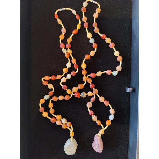 Stunning Gobi Desert agate bead necklace in warm orange, red, pink tones with teardrop charms