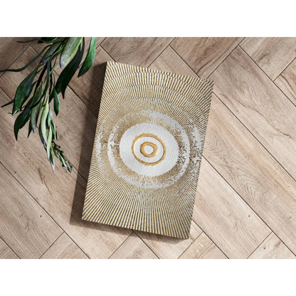 Gold textured circle rug on wood floor, stunning aluminum wall art print