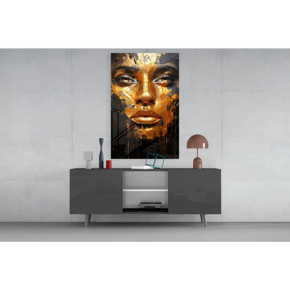 Gold leaf face wall art print on gray sideboard with modern lamp