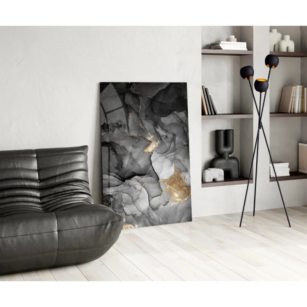 Stunning black and gold glass wall art with fluid marble patterns