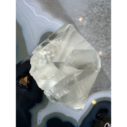 Stunning golden calcite crystal from India on agate, 513g